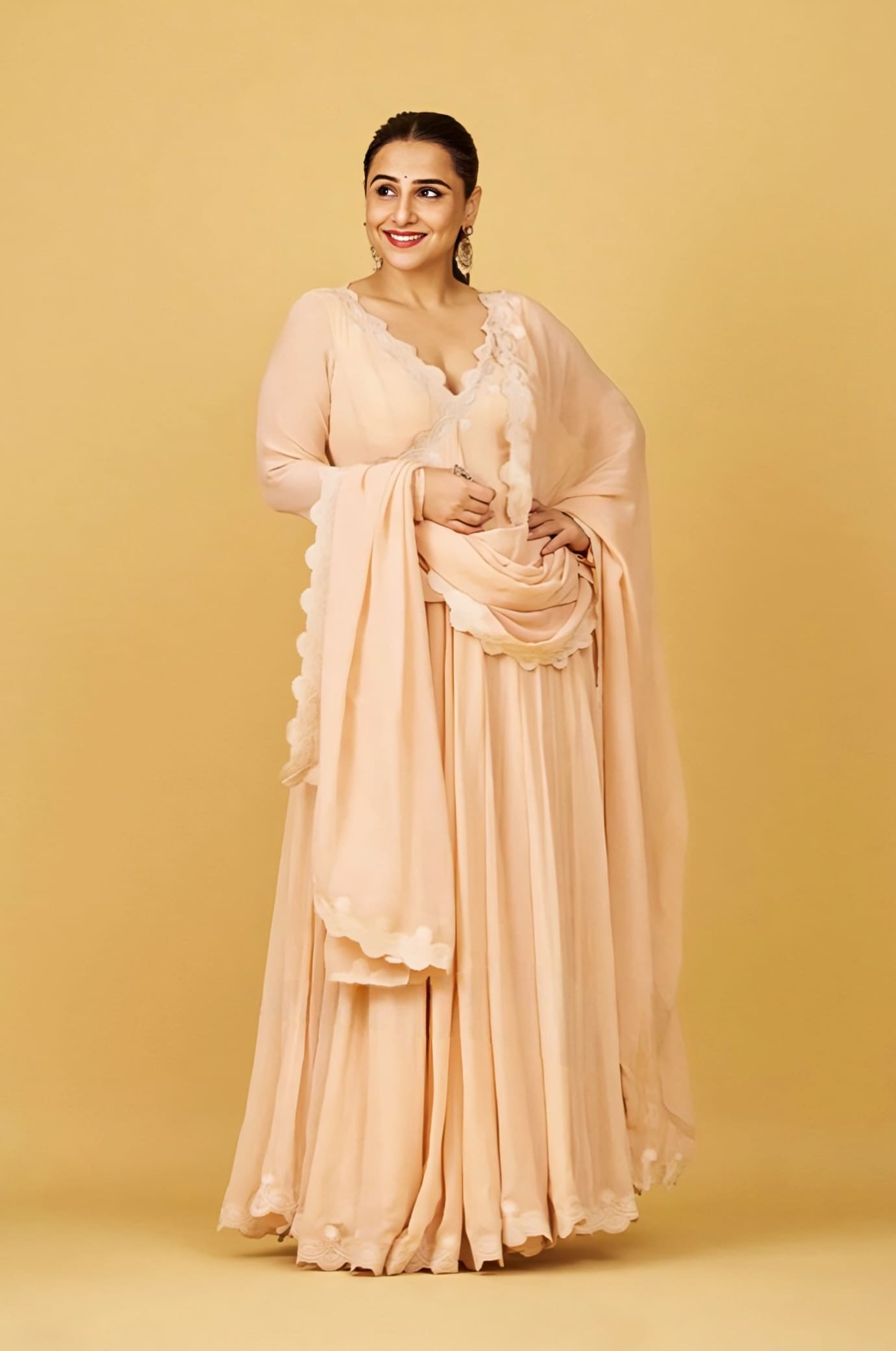 Vidya Balan inspired peach georgette Anarkali set with dori embroidery and cotton silk churidar for festive wear