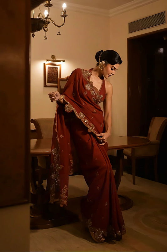 Jacqueline Fernandez inspired red embroidered georgette saree set with silk blouse for wedding and festive wear