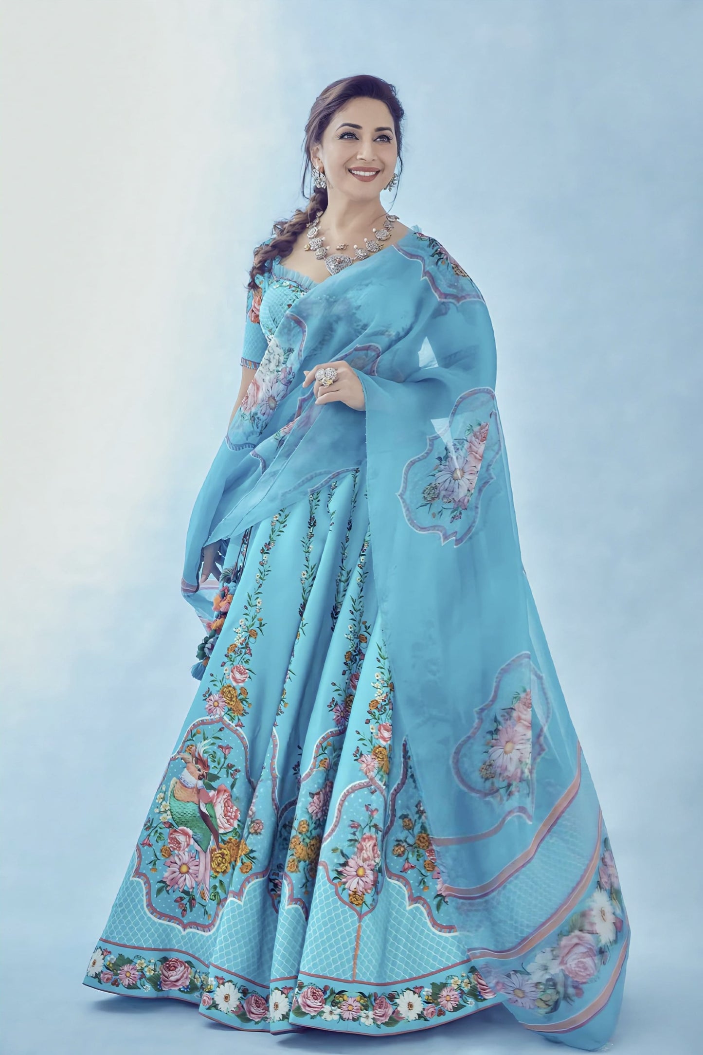 Blue linen satin lehenga with digital print and embroidery inspired by Madhuri Dixit