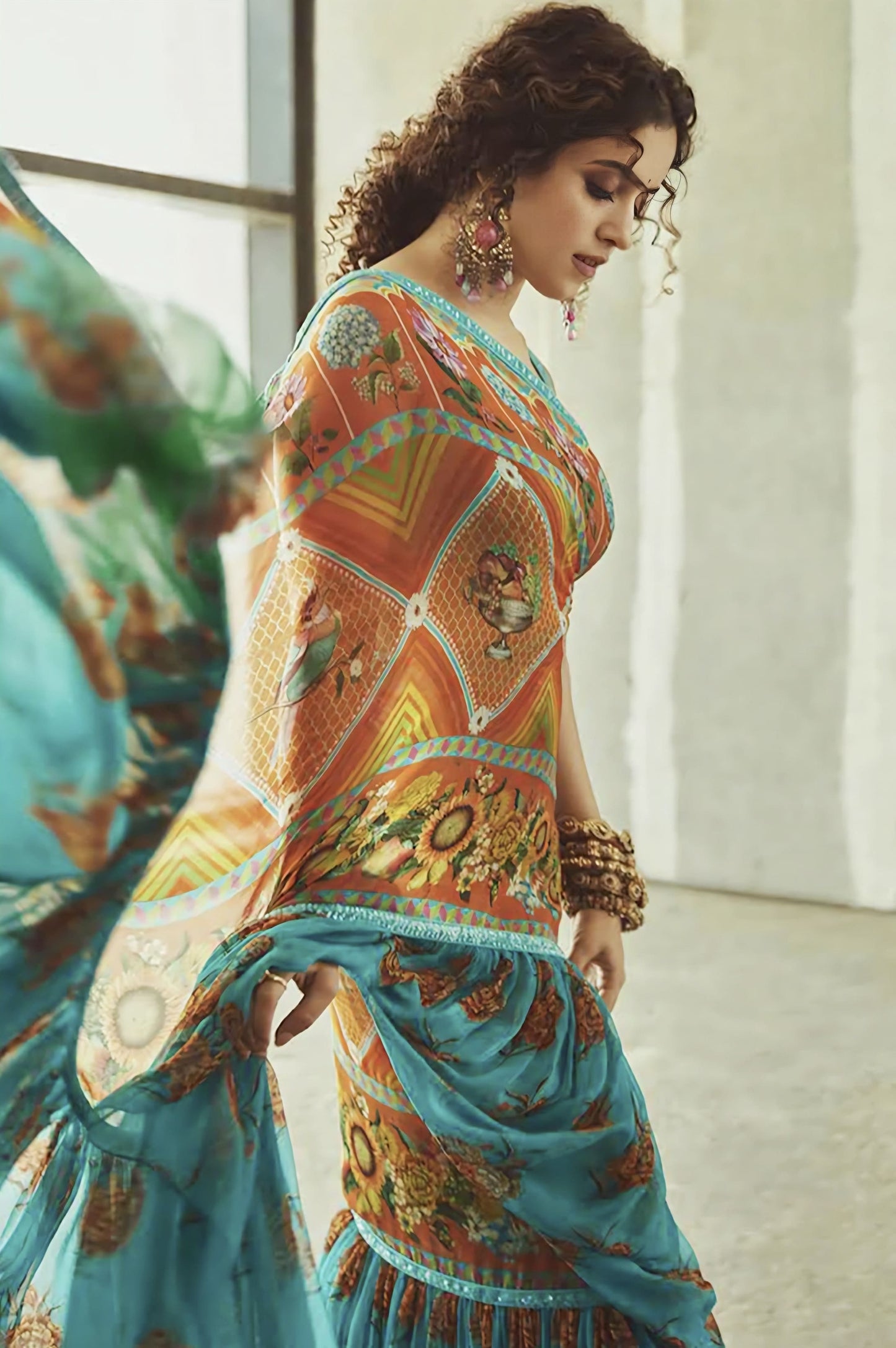 Blue chiffon saree with digital print and embroidery inspired by Sanya Malhotra