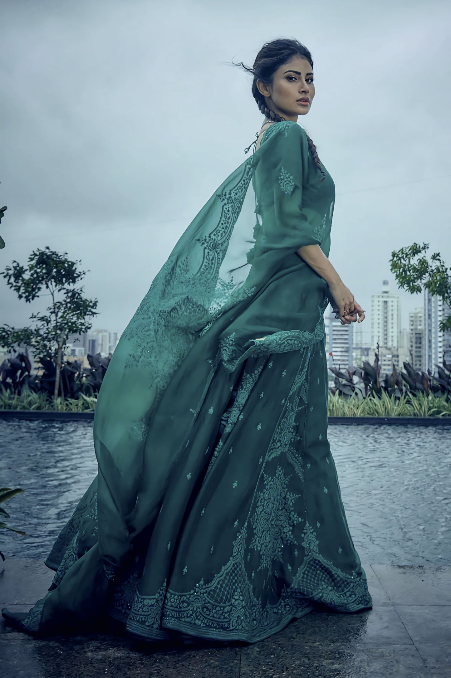 Green silk organza embroidered lehenga with net blouse inspired by Mouni Roy