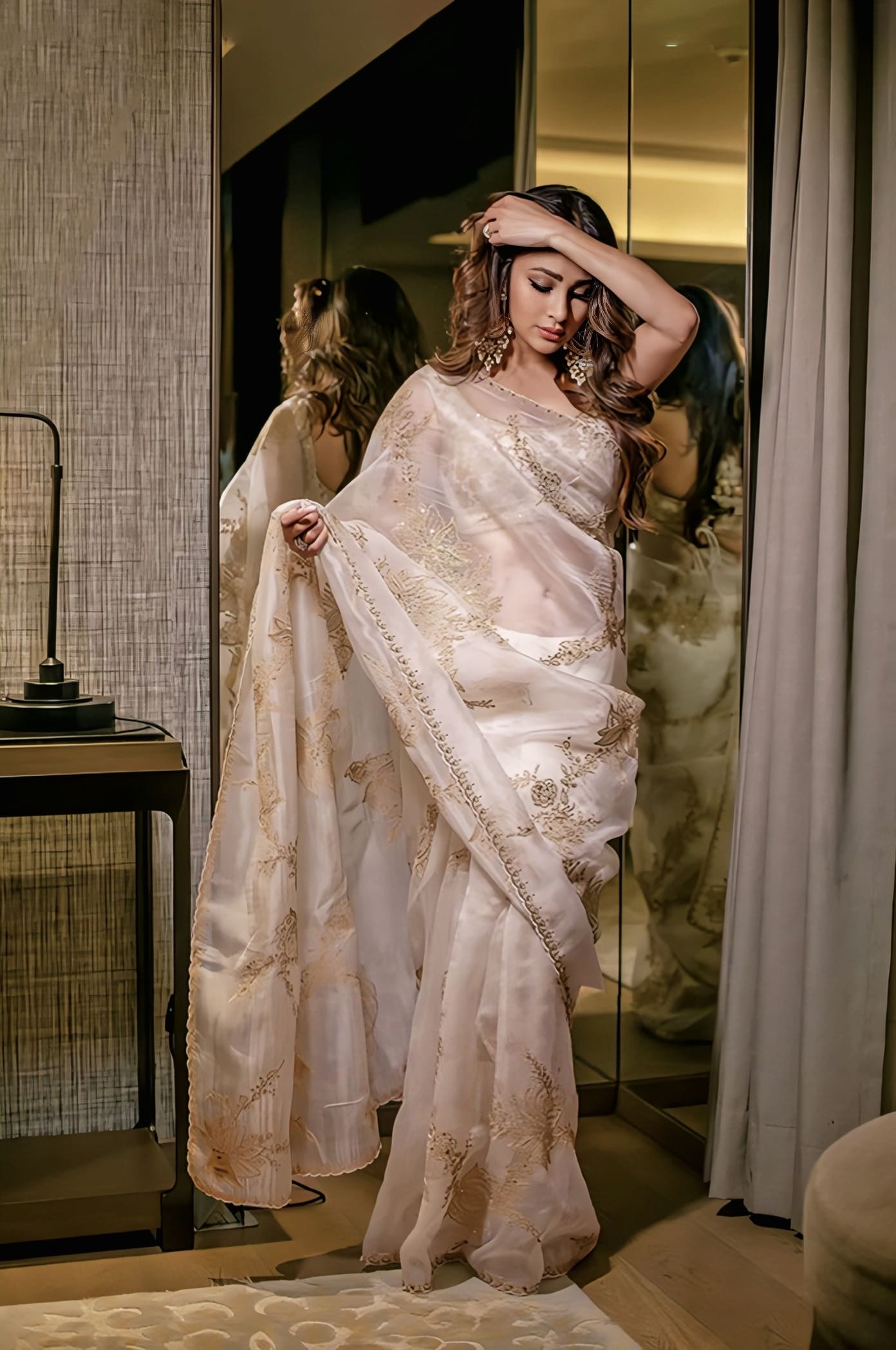 Ivory organza embroidered saree with silk blouse inspired by Mouni Roy