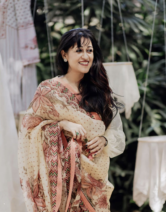 Beige silk organza saree with digital print inspired by Nisha Narayanan