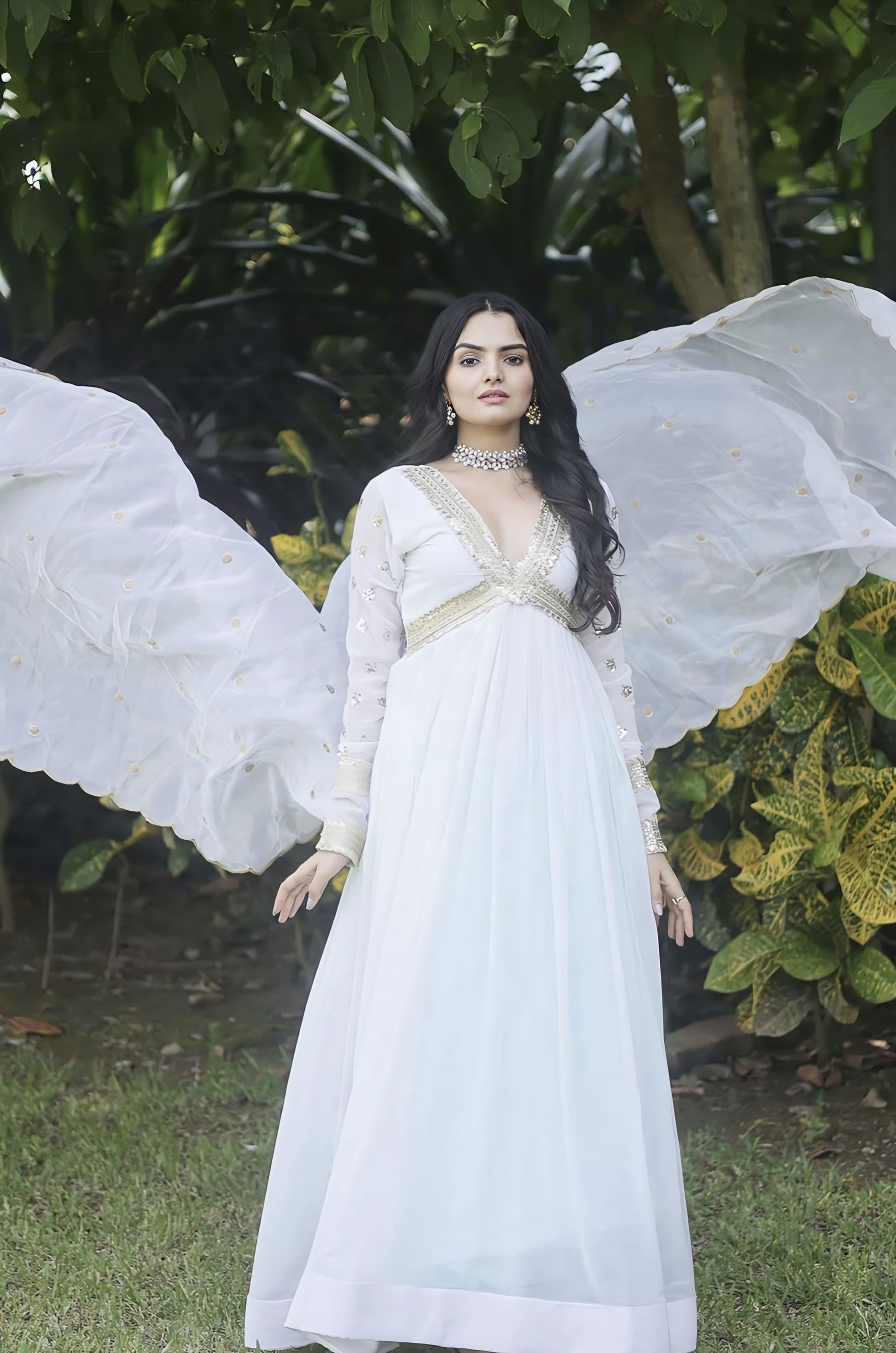 White faux blooming gown with zari sequins embroidery, fancy V-neck, full sleeves, cotton lining, and embroidered dupatta for festive and wedding wear