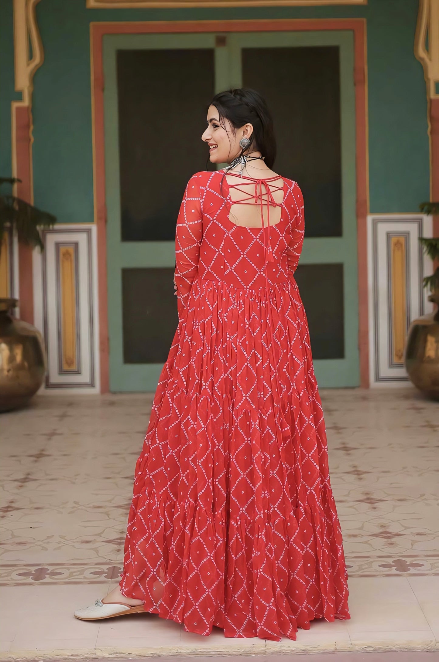 Orange Bandhani Print Georgette Gown with Embellished Kutchi Patchwork Yoke