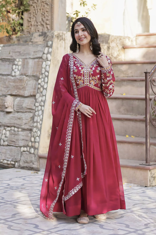Pink faux blooming gown set with zari sequin embroidery, embroidered full sleeves, V-neck, and designer dupatta with lace border for festive and wedding wear