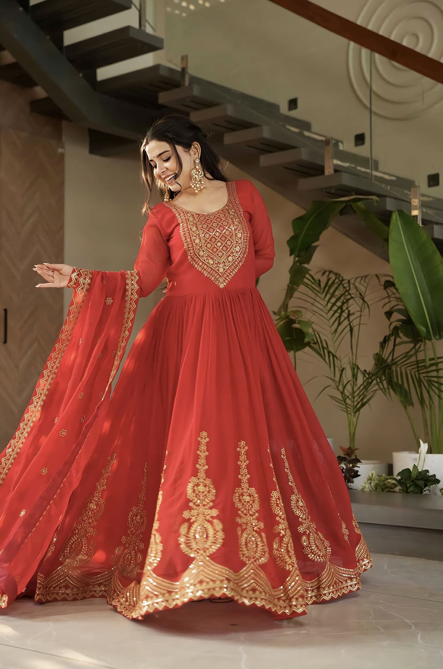 Red faux blooming gown with zari sequins embroidery, full sleeves, round neck, cotton lining, and designer dupatta with lace border for festive and wedding wear