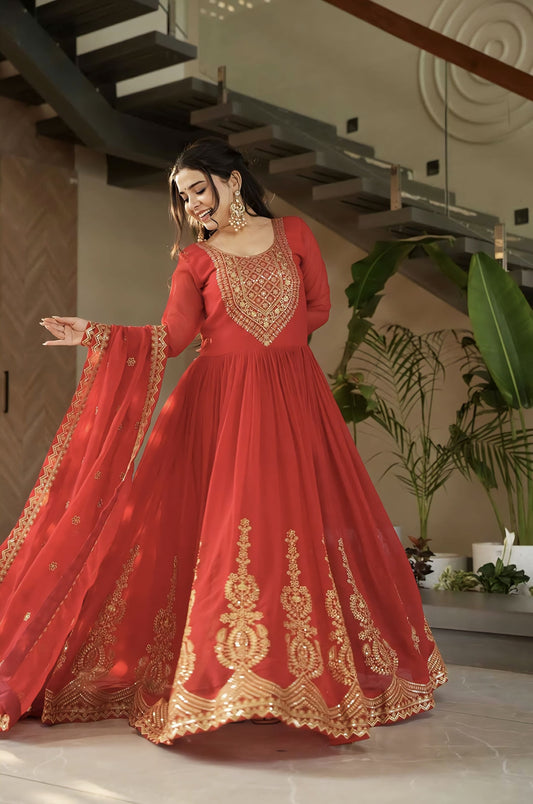 Red faux blooming gown with zari sequins embroidery, full sleeves, round neck, cotton lining, and designer dupatta with lace border for festive and wedding wear