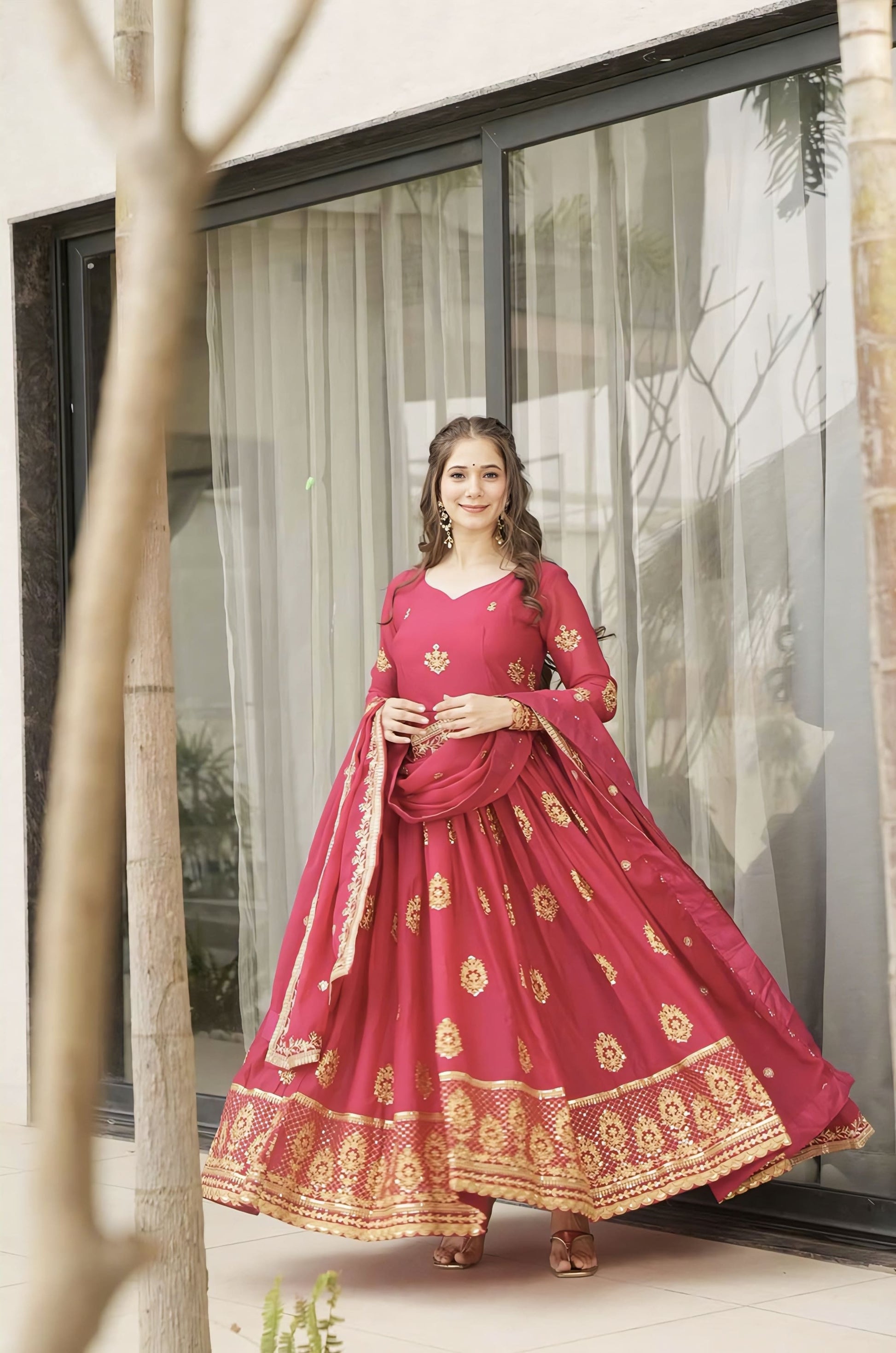 Pink star georgette gown with zari sequin embroidery, pan shape neckline, full sleeves, cotton lining, and designer dupatta with lace border for festive and wedding wear