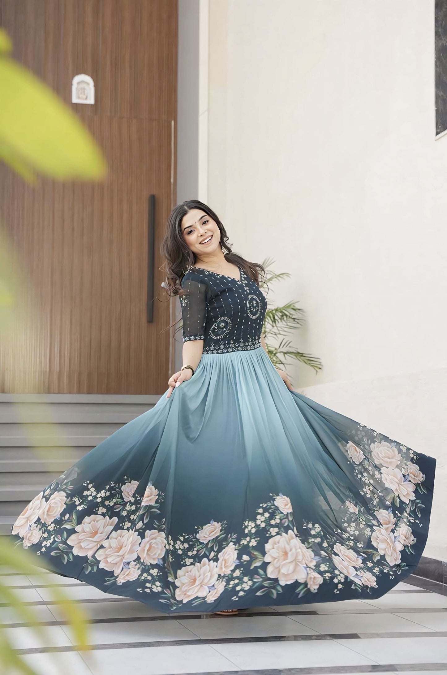 Rama faux blooming gown with beads embroidered bodice, floral digital print skirt, round neck, half sleeves, and cotton lining for festive and party wear