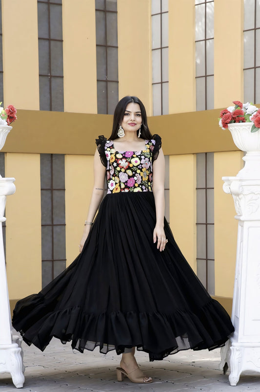 Black faux blooming gown with sequins multi-thread embroidery, square neck, sleeveless double frill shoulders, frill stitch detailing, and cotton lining for festive wear