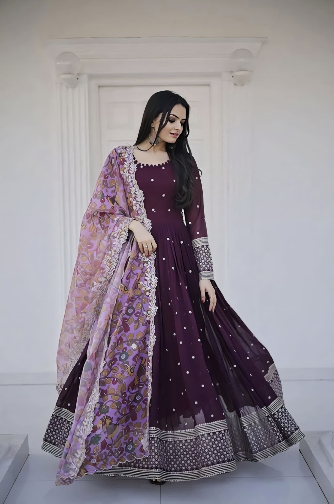 Wine faux blooming gown with zari sequins embroidery, full sleeves, round potli neck, cotton lining, and soft organza cutwork dupatta for festive and wedding wear