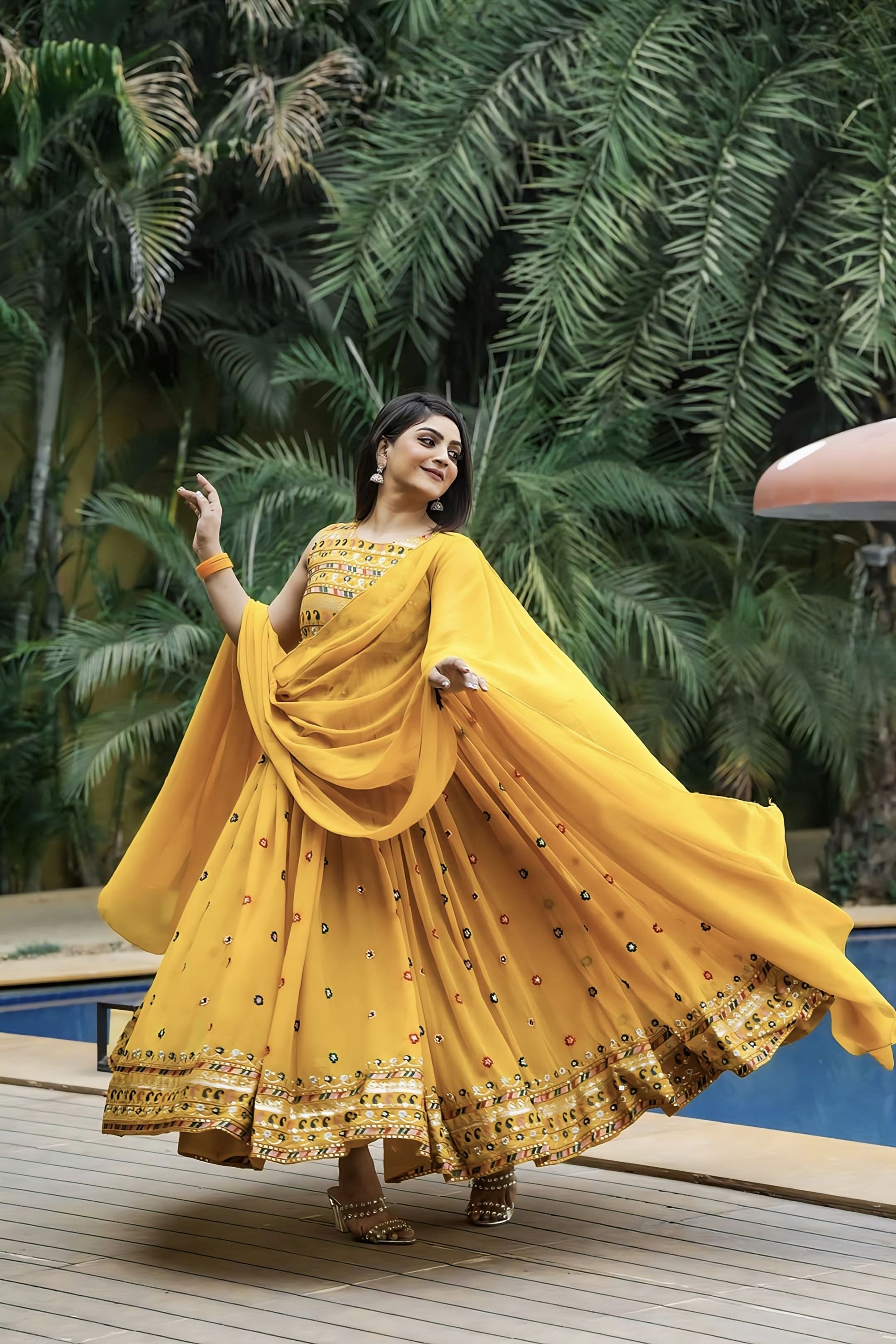 Yellow fox georgette embroidered gown with soft micro inner lining and matching dupatta for festive and wedding wear