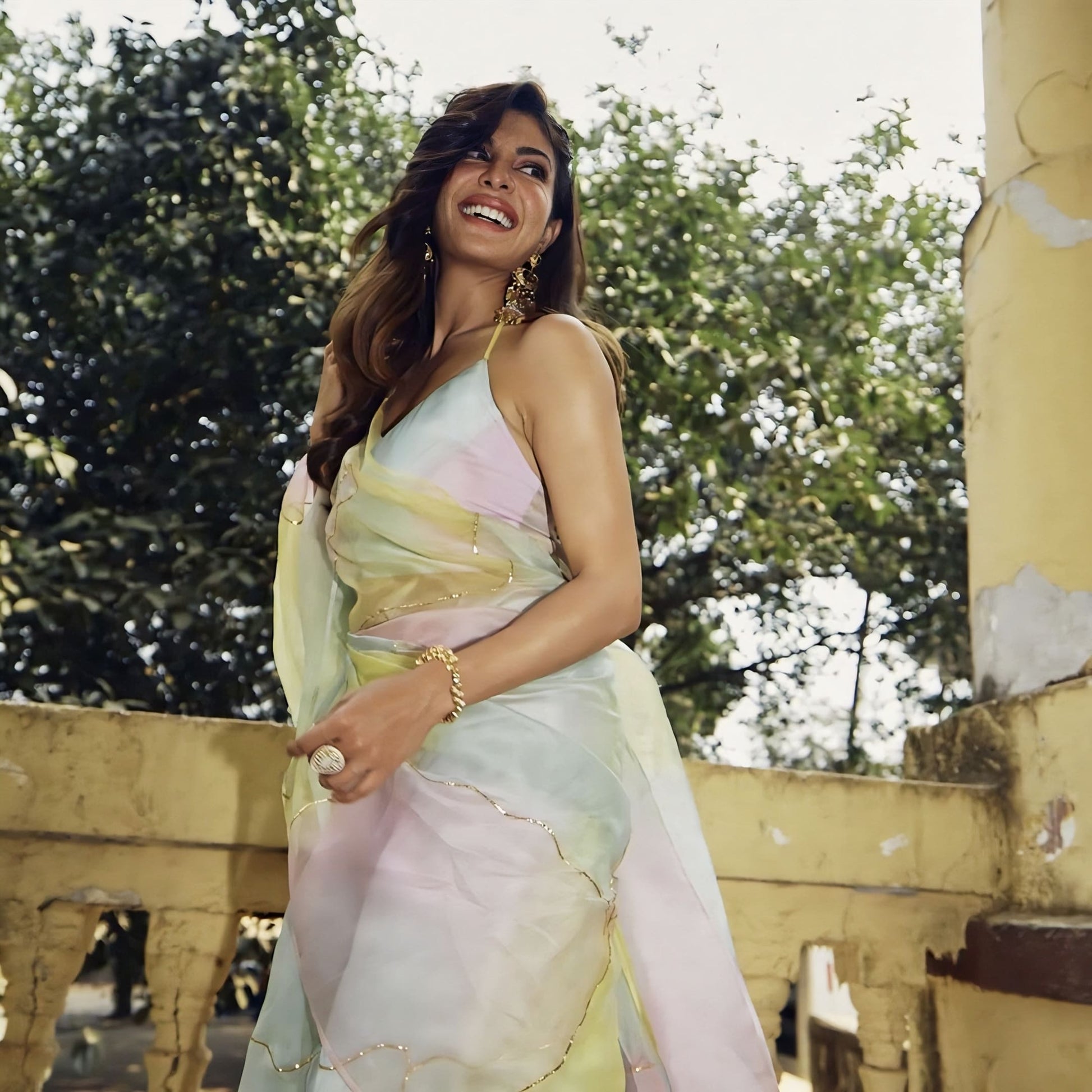 Jacqueline Fernandez inspired pastel silk organza saree with hand painted pink blue lemon shades and gota embroidery
