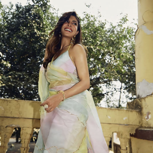 Jacqueline Fernandez inspired pastel silk organza saree with hand painted pink blue lemon shades and gota embroidery