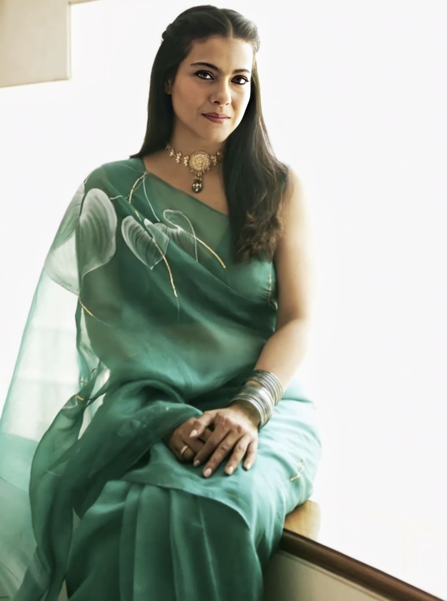 Kajol inspired emerald green silk organza saree with hand painted white anthurium flowers and gota embroidery