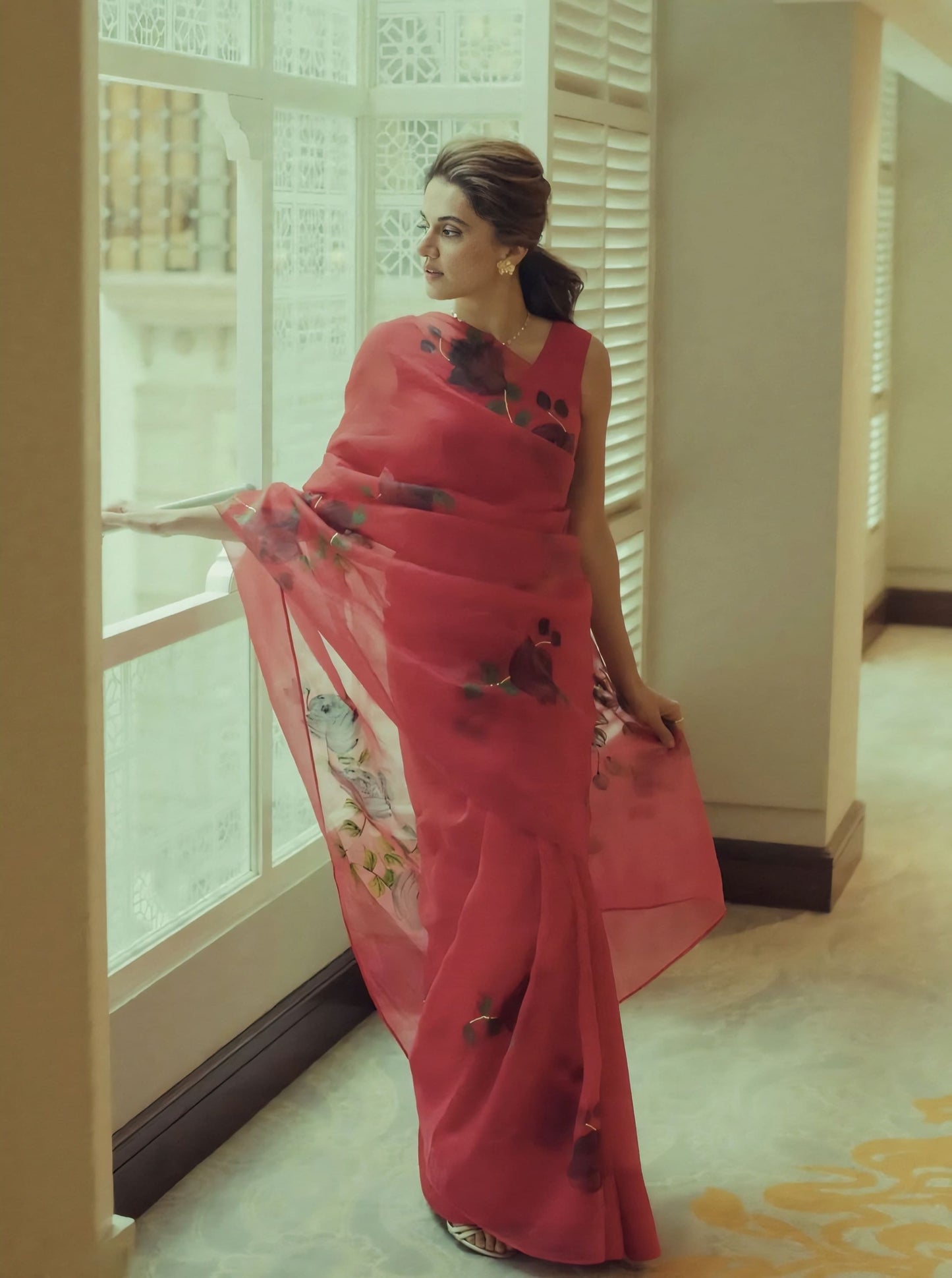 Taapsee Pannu inspired red silk organza saree with hand painted black roses and gota embroidery