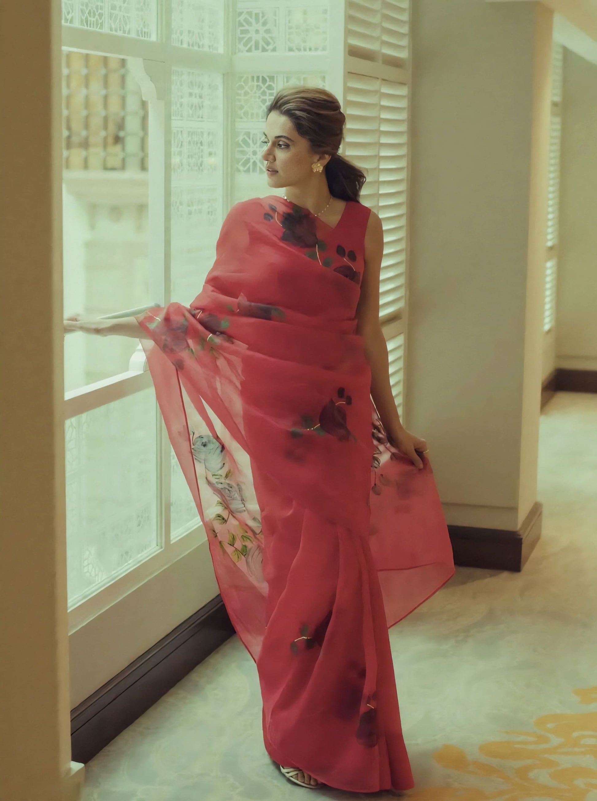 Taapsee Pannu inspired red silk organza saree with hand painted black roses and gota embroidery