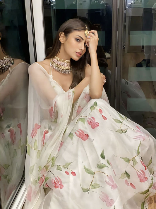 Mouni Roy inspired ivory organza lehenga with hand painted pink fuchsia flowers and gota embroidery with chiffon dupatta
