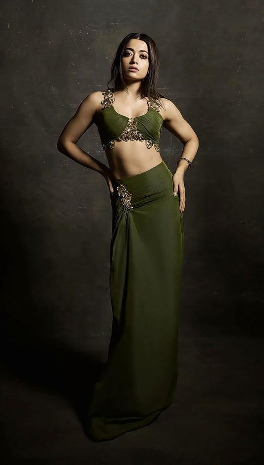 Rashmika Mandanna inspired green taffeta draped skirt with metallic embellishments and embroidered bustier with 3D metallic neckline