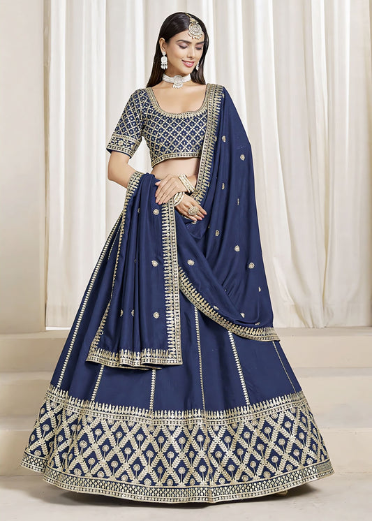 Prussian blue art silk lehenga choli with thread, zari, and sequins embroidery for wedding, reception, and festive wear