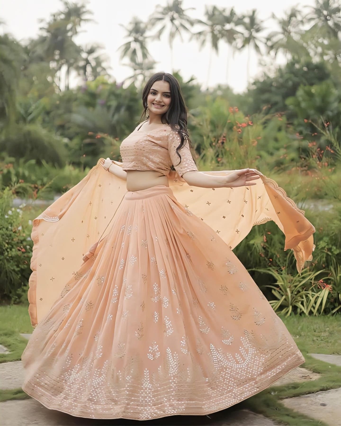 Peach Faux Georgette Lehenga Choli with Heavy Sequins & Zari Embroidery