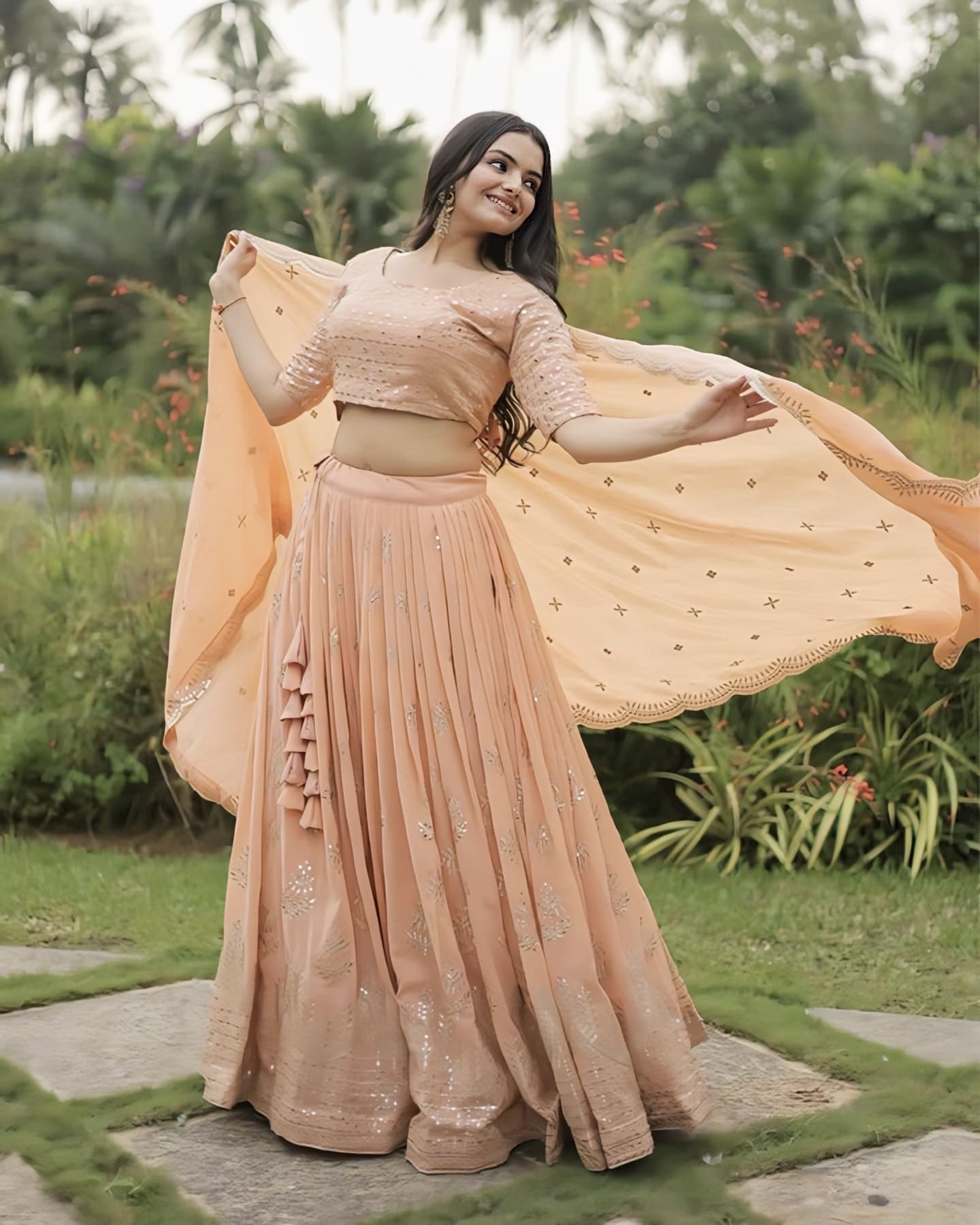 Peach Faux Georgette Lehenga Choli with Heavy Sequins & Zari Embroidery