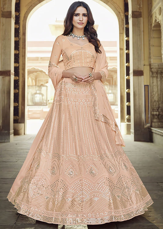 Peach festive georgette lehenga choli with sequins silver embroidery, matching choli, and scalloped border dupatta for wedding and festive wear