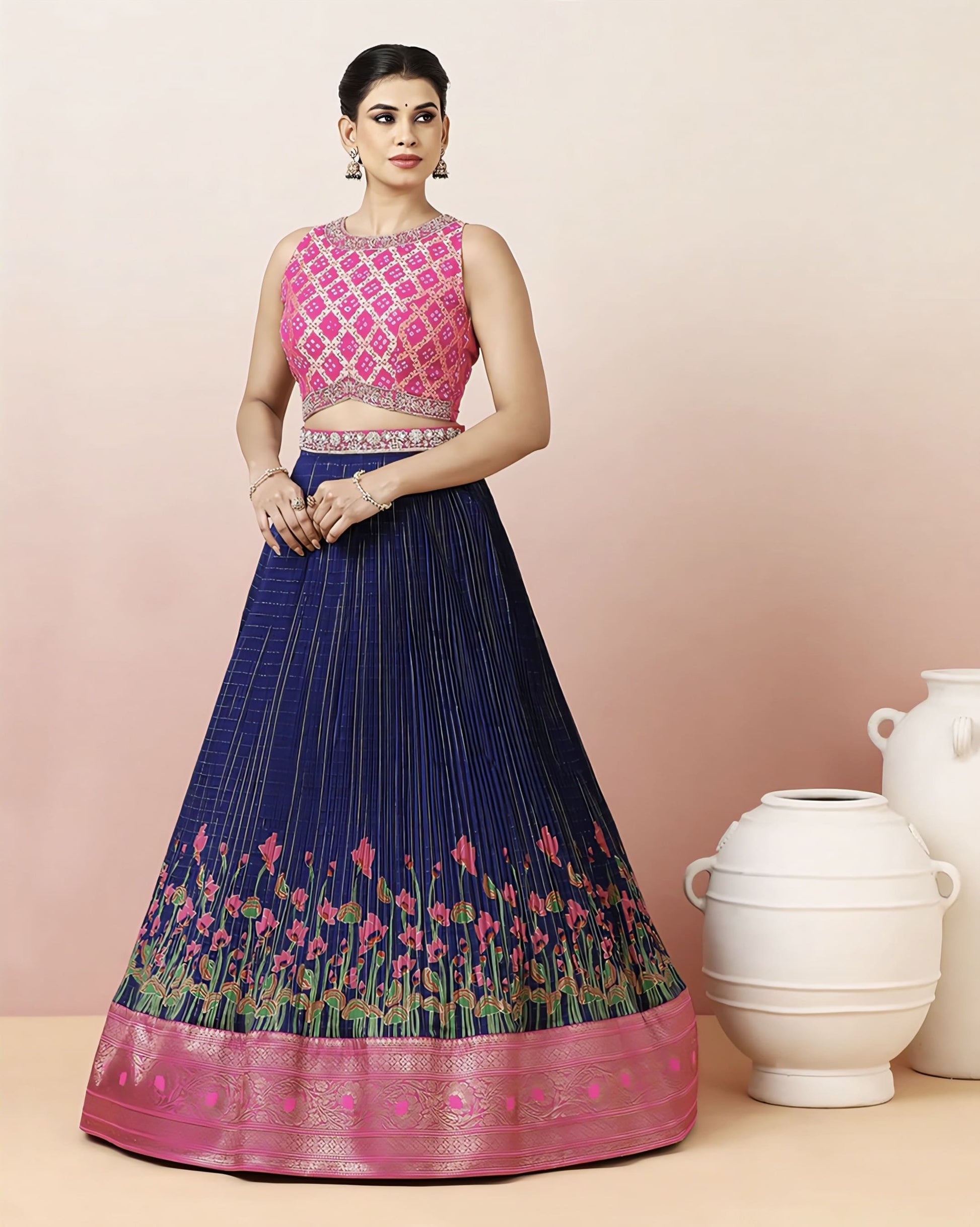 Pink Bandhej embroidered blouse with navy blue hand block printed skirt and detachable belt for festive and ethnic wear