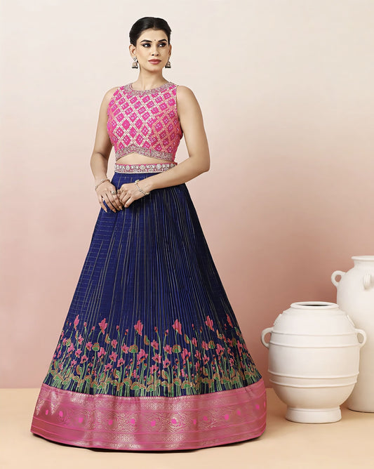 Pink Bandhej embroidered blouse with navy blue hand block printed skirt and detachable belt for festive and ethnic wear