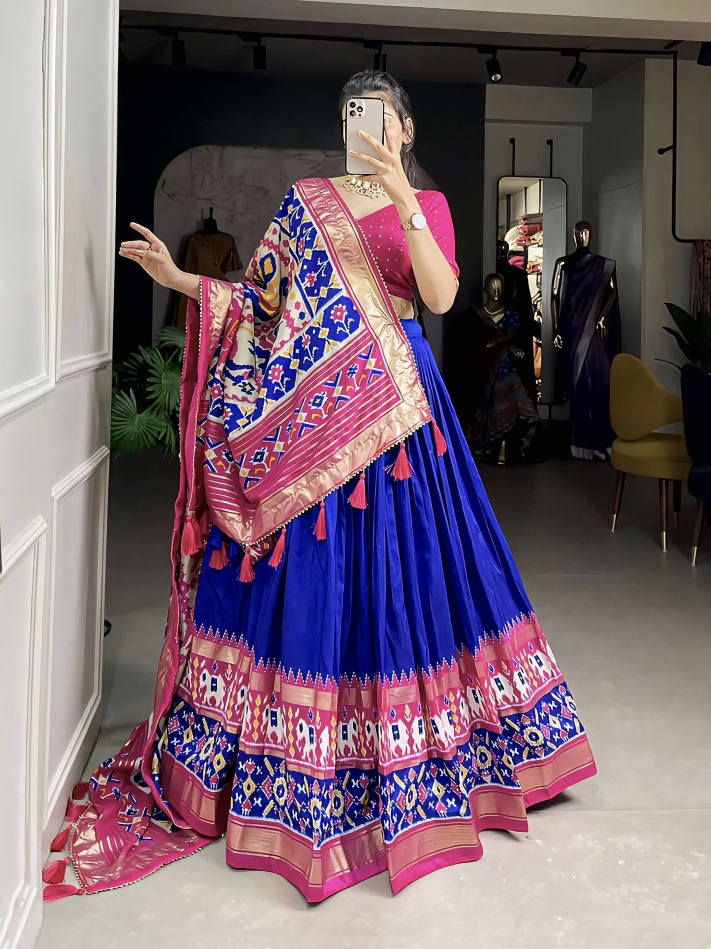 Royal blue tussar silk lehenga choli with Ikkat Patola print and foil work for wedding, festive, and party wear