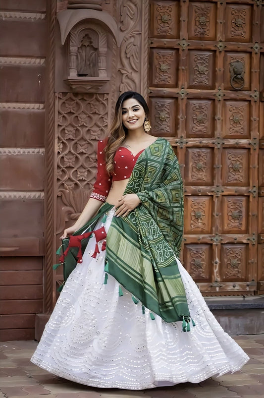 White georgette party wear lehenga choli with elegant embroidery work and matching blouse for weddings and festive occasions