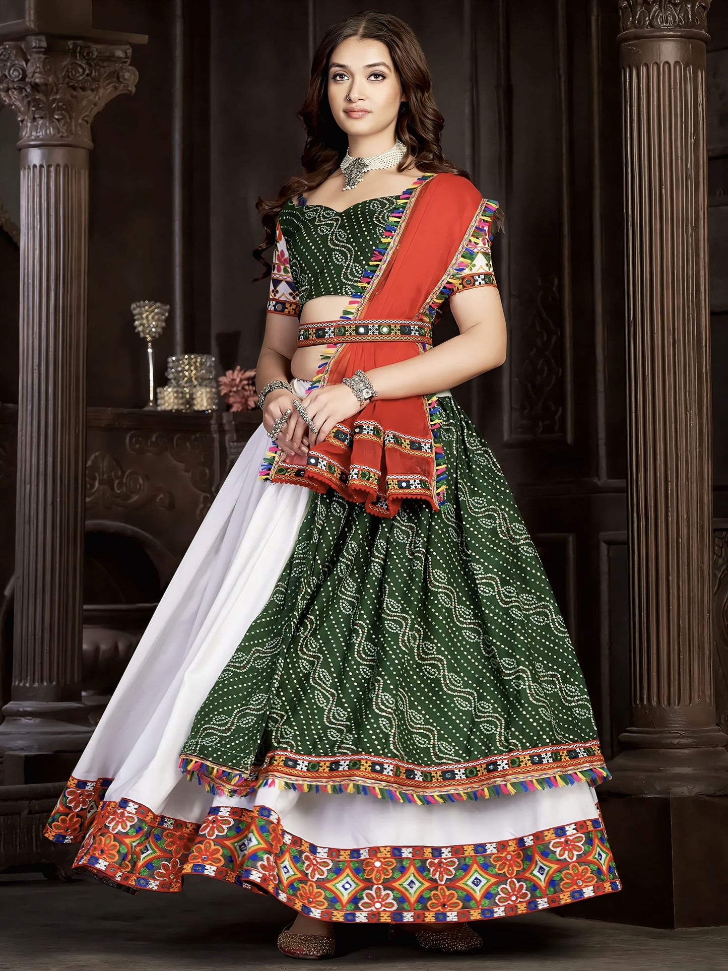 White and green Bandhej print Navratri lehenga with Banglory silk choli, colorful threadwork, and traditional red dupatta for Garba and festive wear