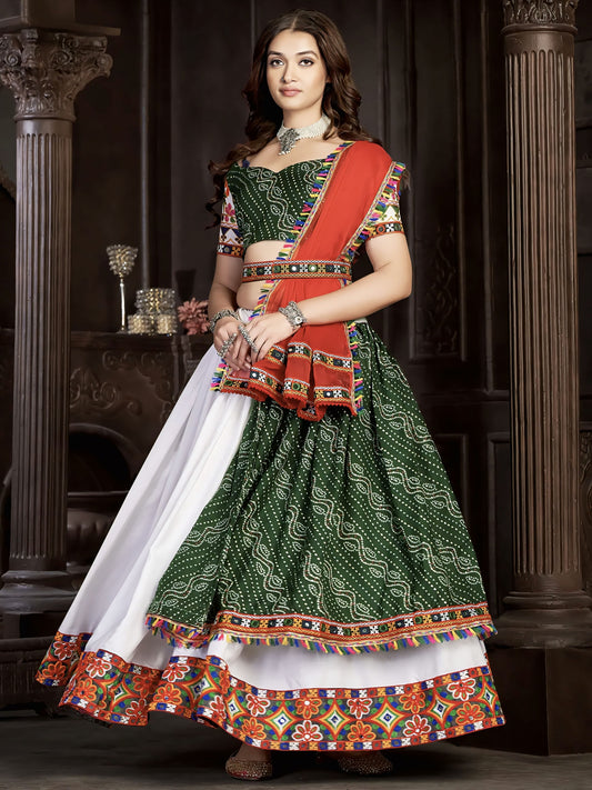 White and green Bandhej print Navratri lehenga with Banglory silk choli, colorful threadwork, and traditional red dupatta for Garba and festive wear