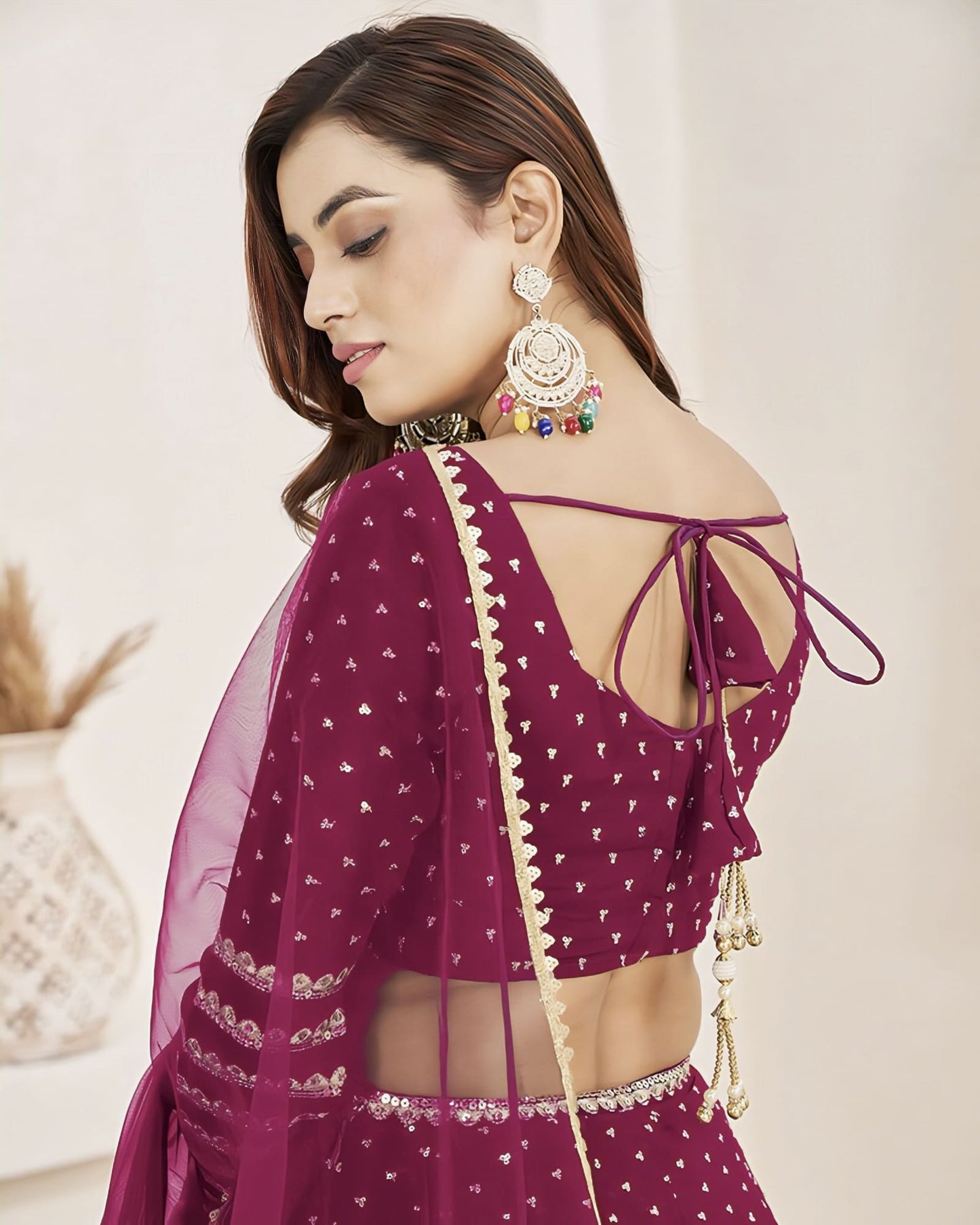 Pink Georgette Lehenga Choli with Sequins Zari Embroidery & Net Dupatta