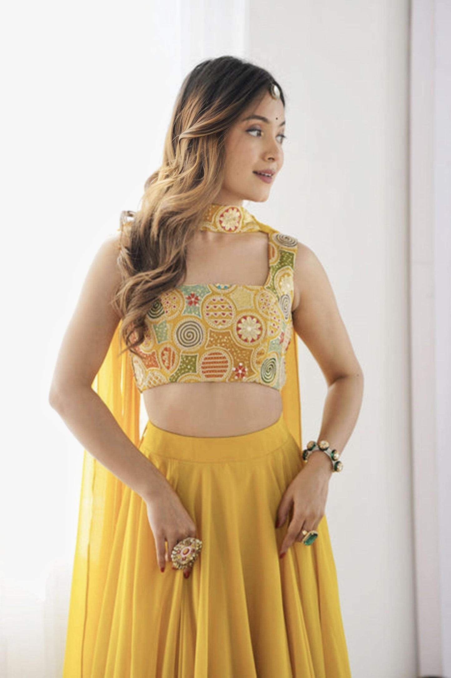 Yellow Fully Flared Fox Georgette Lehenga Choli with Intricate Embroidery