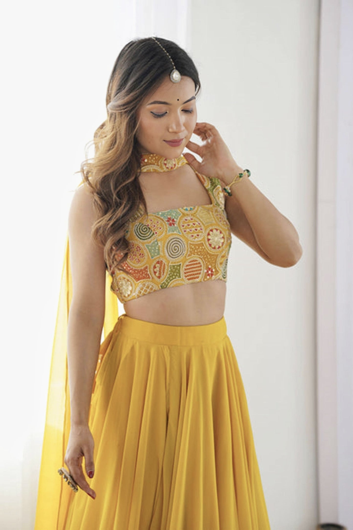 Yellow Fully Flared Fox Georgette Lehenga Choli with Intricate Embroidery