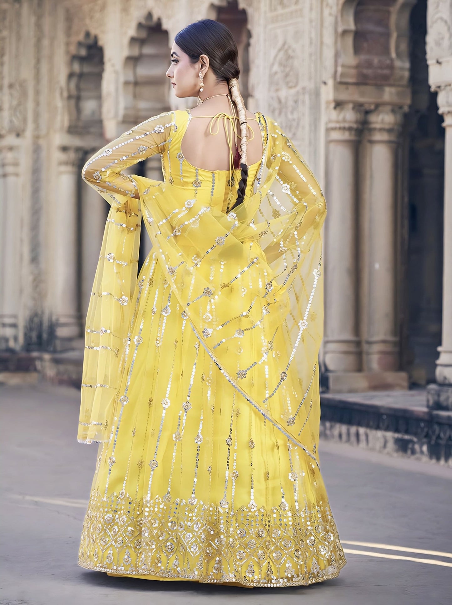 Classic Yellow Soft Net Lehenga Choli with Sequence Embroidery for Party Wear