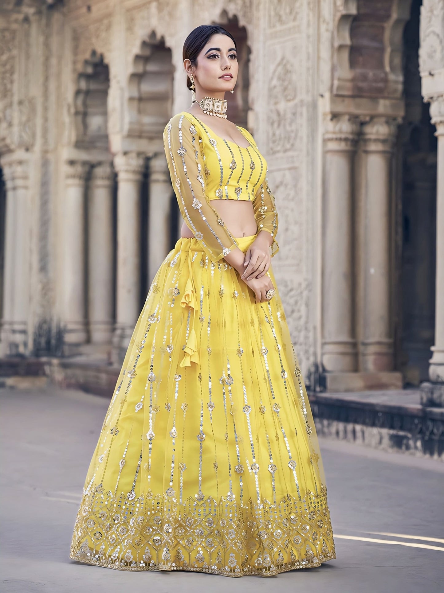 Classic Yellow Soft Net Lehenga Choli with Sequence Embroidery for Party Wear
