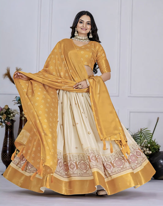 Yellow Lichi silk ghagra choli with jacquard zari work, printed detailing, matching blouse, and dupatta for wedding guest and festive wear