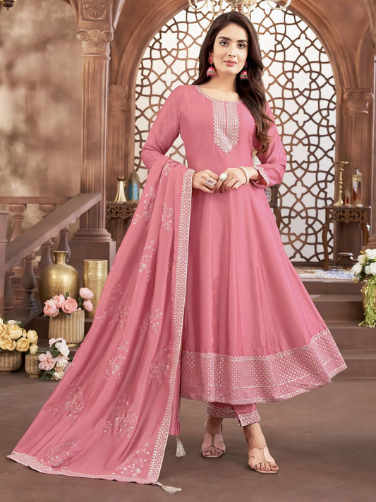 Pink rich silk salwar suit with resham and sequins work, full sleeves, round neck, pants, and deep purple dupatta for festive wear