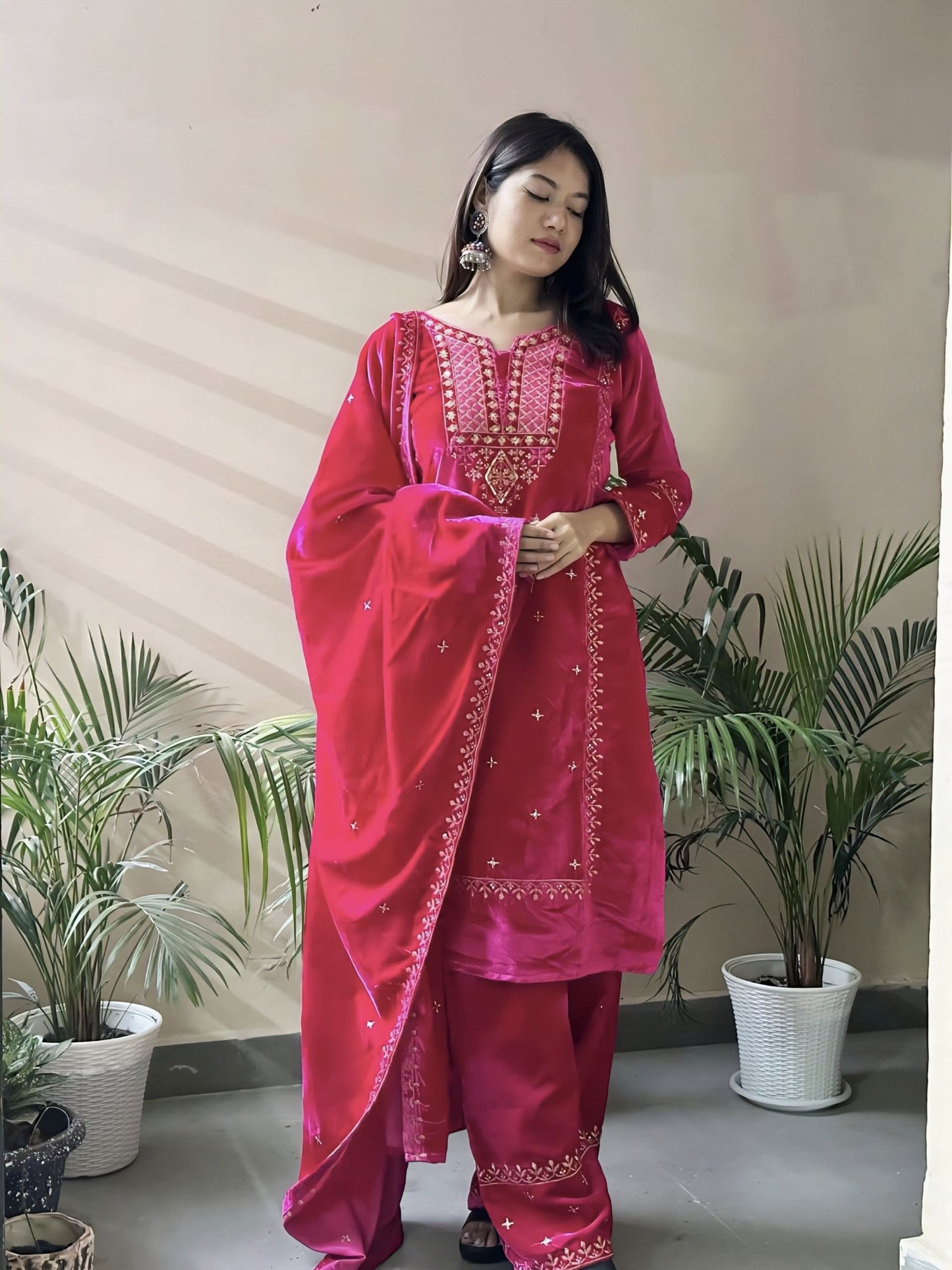 Pink heavy velvet salwar suit with thread and sequence work and matching velvet dupatta for party and festive wear