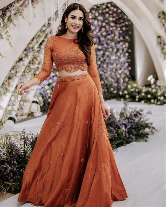 Rust orange crop top lehenga sleeves design