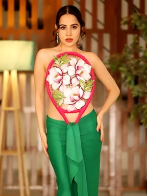 Urfi Javed floral tennis racket shaped top with vibrant green skirt sporty couture fashion look