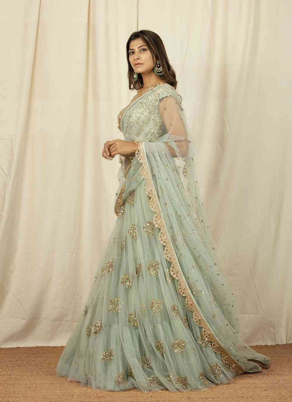 Unique Olive Green Colored Embroidery Work Party Wear Designer Net with Raw Silk Bridesmaid Lehengas LC280